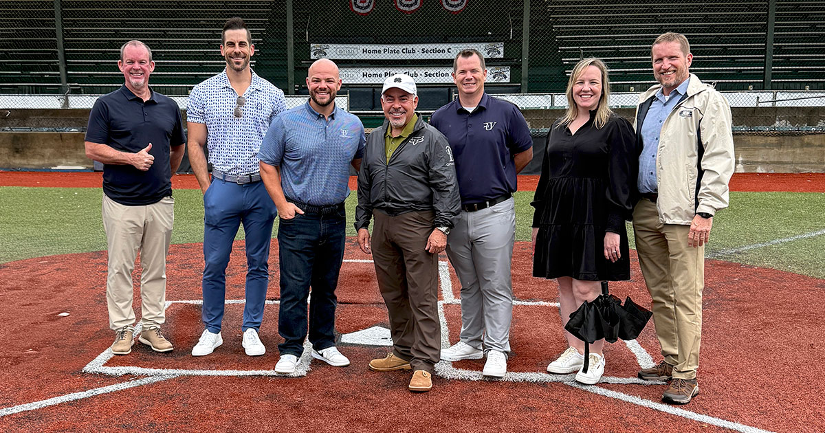 Mayor Bobby Gutierrez pictured with REV Entertainment and City of Bryan staff at Travis Major Field