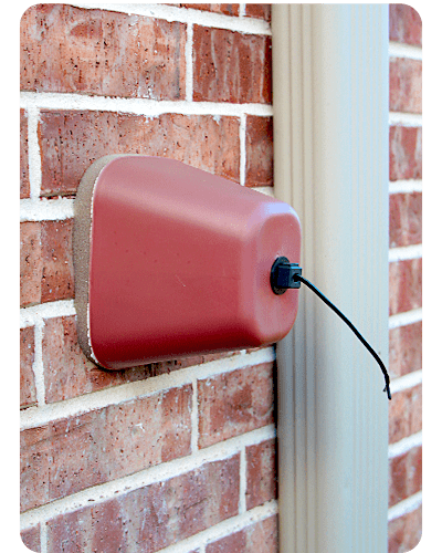 outdoor faucet covered by a styrofoam freeze protector