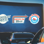 Drive-in movie event at dusk, viewing a large screen displaying "Moonlight Movie at the Park", "Drive-in Movie", and "Dive-in Movie" logos, cars visible in the foreground against a twilight sky.