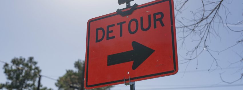 photo of a road detour sign