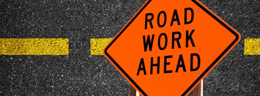 Street sign that reads: Road work ahead