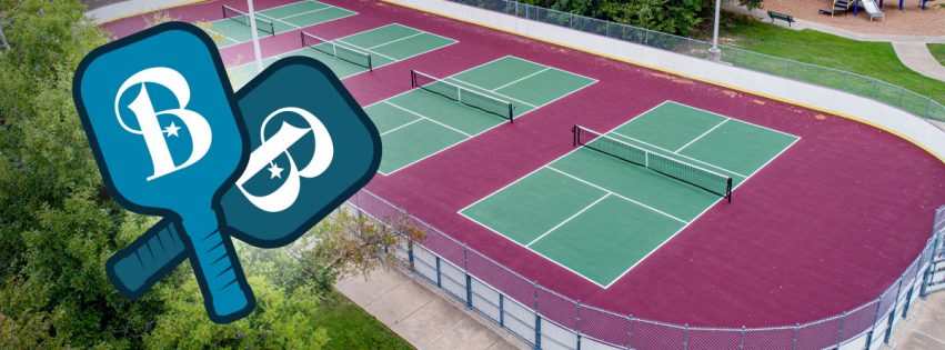 illustrated pickleball paddles with the Bryan logo overlaying an aerial photo of outdoor pickleball courts