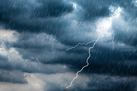 thunderstorm with heavy rain and a lightning bolt