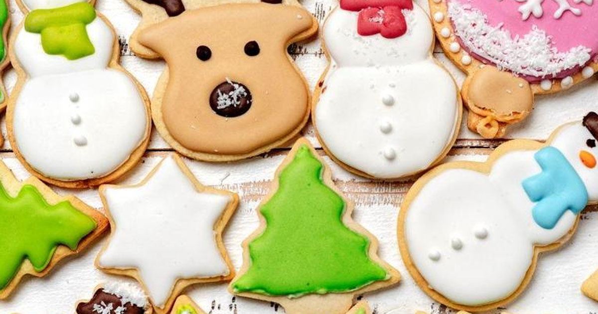 holiday cookies decorated with icing and sprinkles