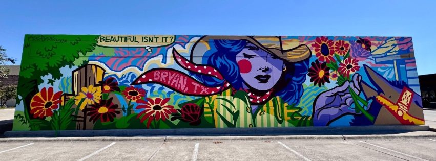 colorful mural on the side of a building featuring a cowgirl holding flowers in a pop art style